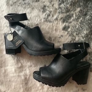 Zara black leather heeled sandals. Never worn .